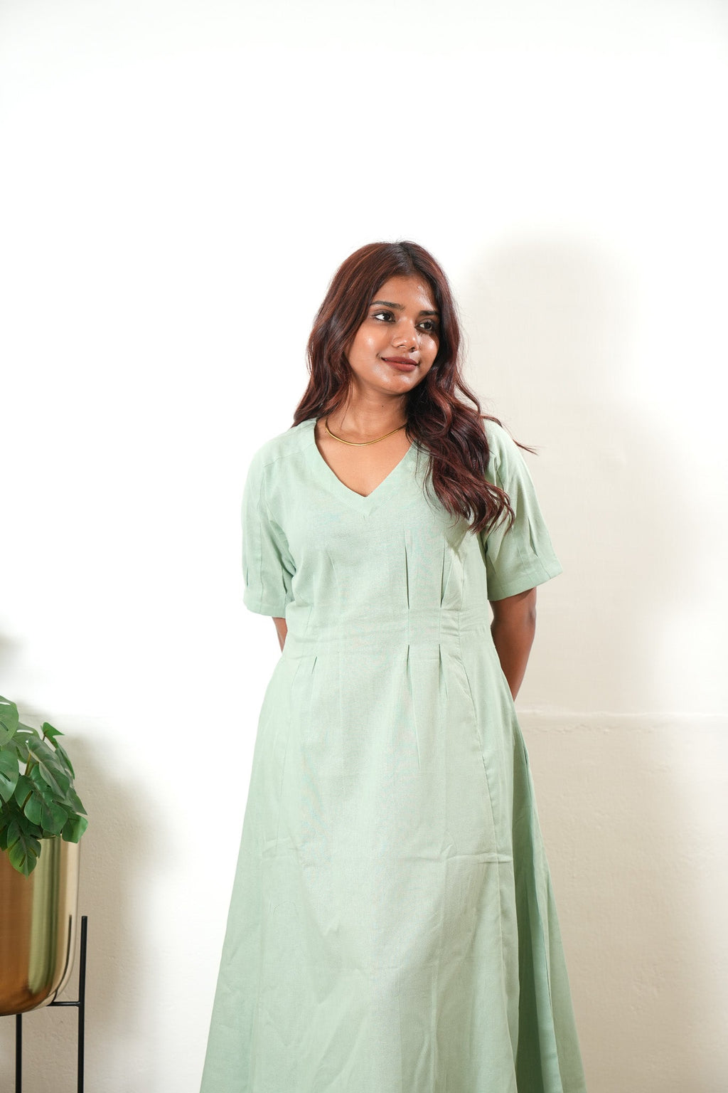 Pastel green linen midi dress