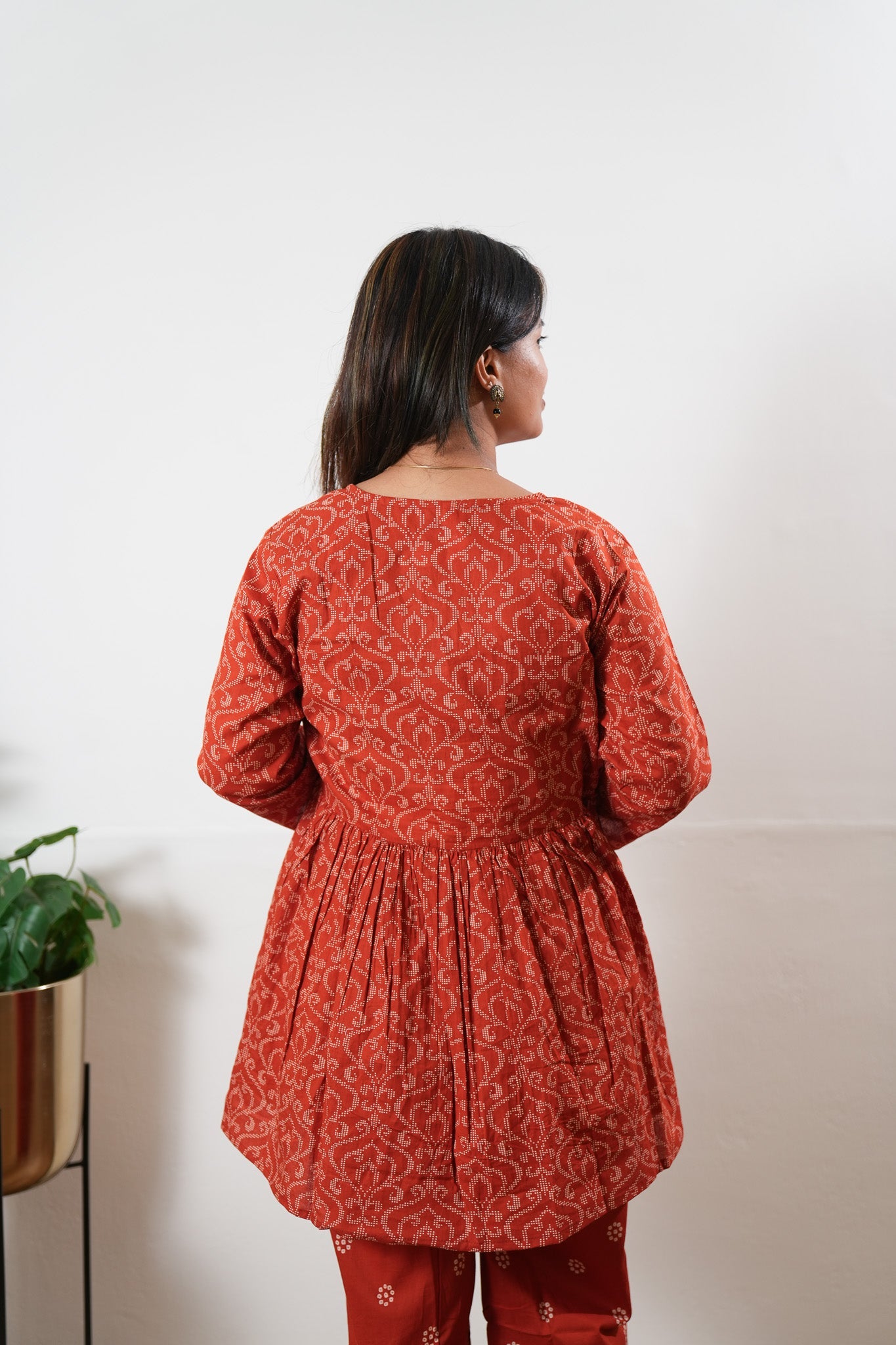 Rust orange peplum button down comfies
